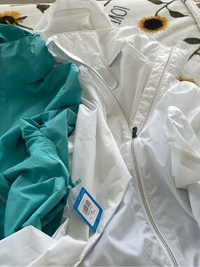2 New Columbia Women's raincoat WHITE and TEAL Hooded Shell. Size Large and XL